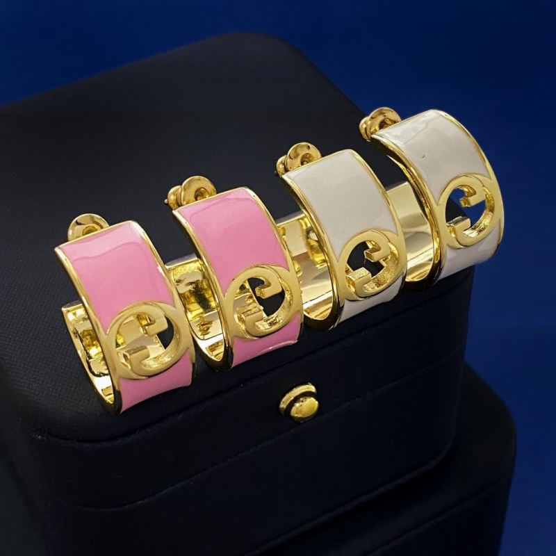 G*u*i earrings